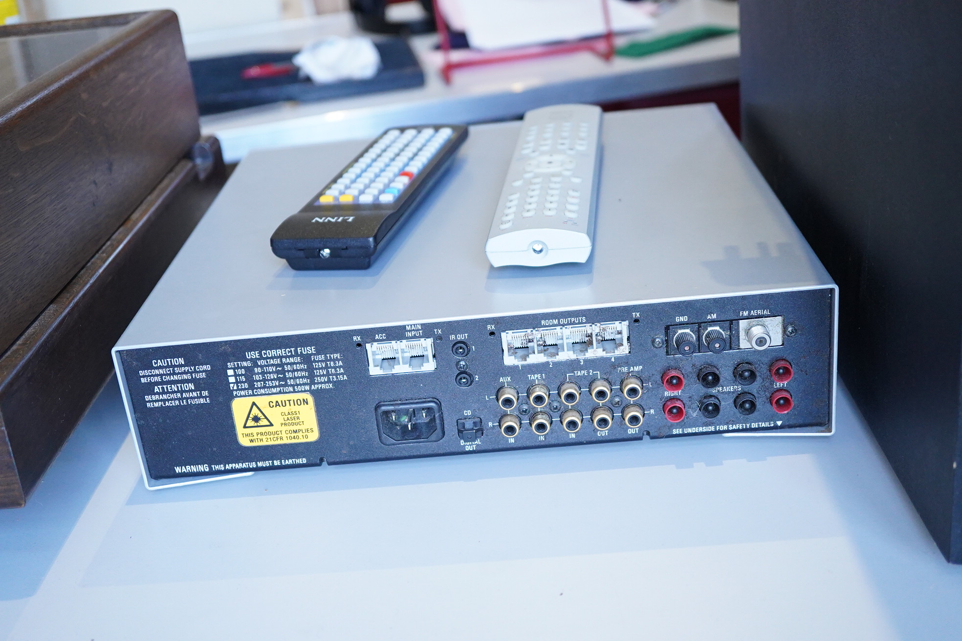 A Linn Classik Music combination CD player, tuner and amplifier in silver finished case, together with two remote controls